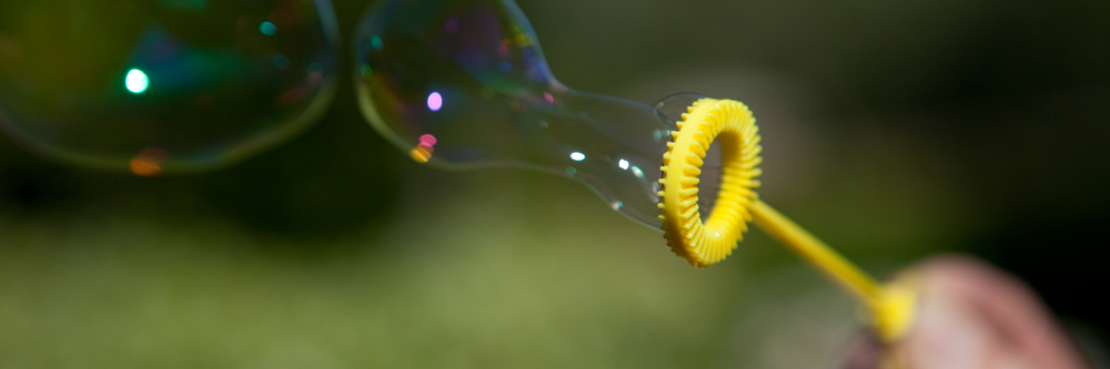 Bubble coming out of yellow bubble wand