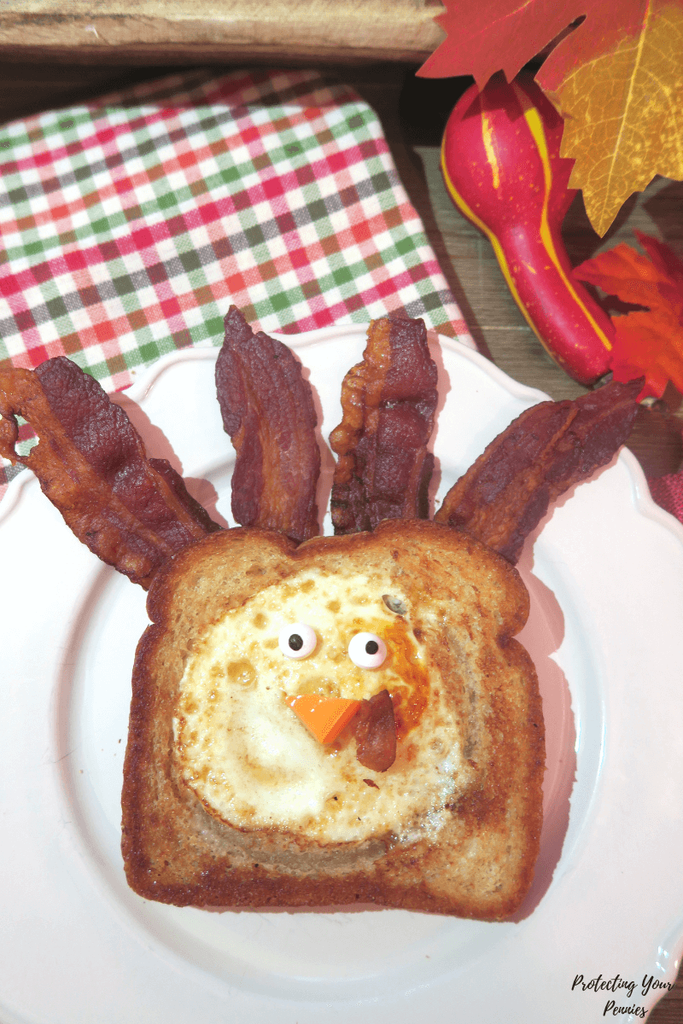"Turkey" made from toast, an eggs, and strips of bacon for feathers