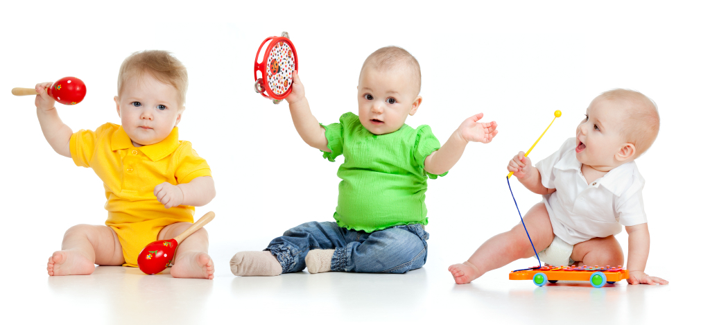Three babies with musical instruments.